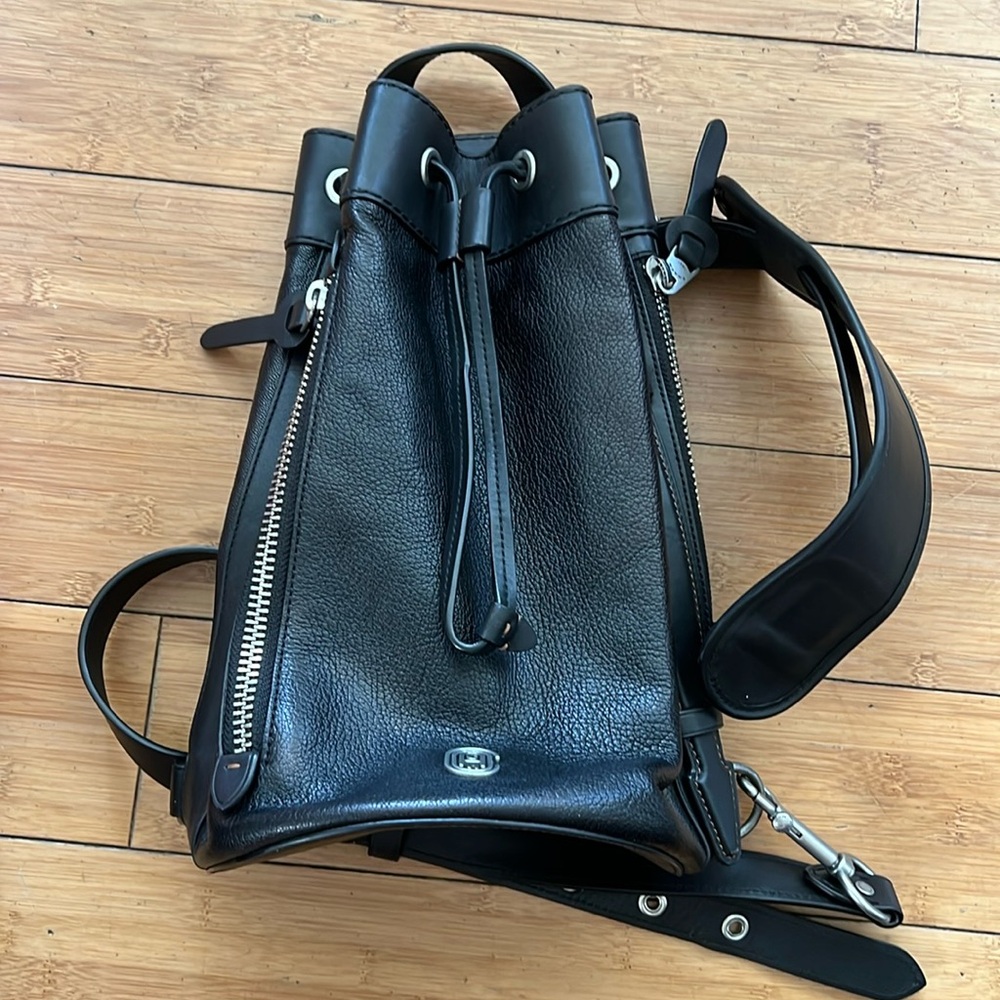 Coach black leather sling bag